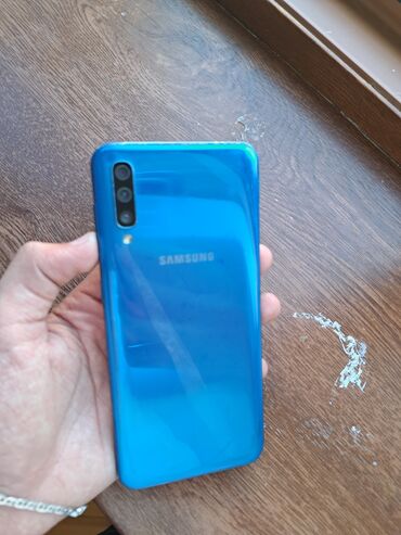 iphone 16 almaq: Samsung Galaxy A50, 64 GB, rəng - Göy, Barmaq izi, Face ID