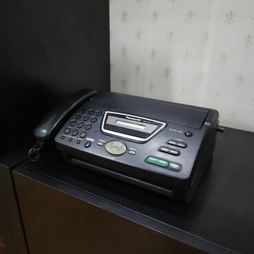 qril aparat: Stasionar telefon Panasonic, Simli
