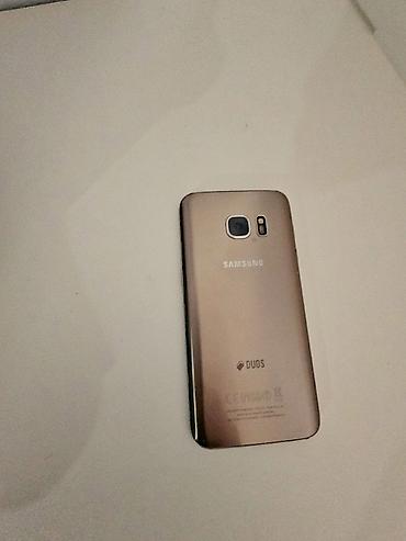 nokia 106 qiymeti: Samsung Galaxy S7, 32 GB, rəng - Qızılı, İki sim kartlı — 1