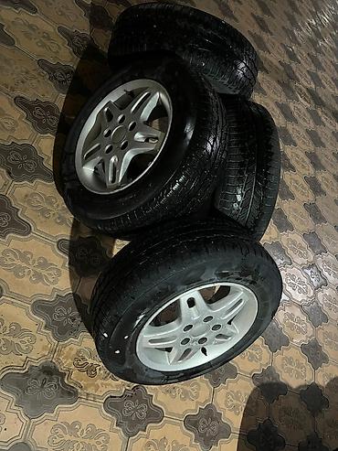 Комплект из 4 автомобильных колес в сборе: зимние шины с дисками прошу — 1