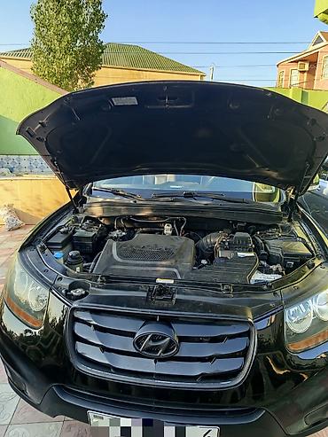 opel duman: Hyundai Santa Fe: 2 l | 2010 il Krossover — 7