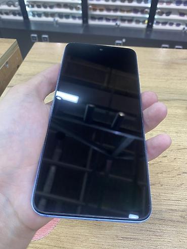 ксяоми 17: Смартфон Redmi 12, голубой цвет корпуса. Ключевые характеристики: - — 2