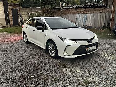 Toyota Corolla: 2022 г., 1.8 л, Вариатор, Гибрид, Седан