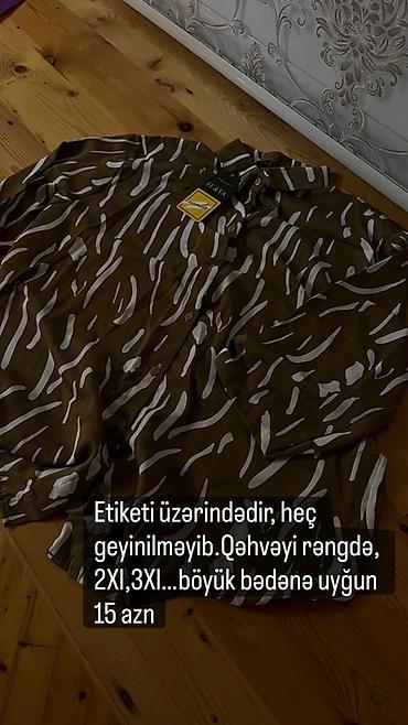 lacoste köynək: Qəhvəyi rəngdə, naxışlı uzun qol köynək. Üzərində etiketi var — 1