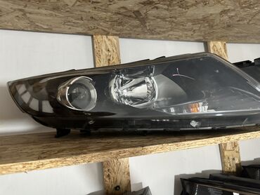 Подкрылки, брызговики, защита днища: Передняя левая фара Kia
