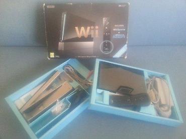 Nintendo Wii: 🎮 Nintendo Wii konzola – komplet + 64GB + 50 igara Prodajem Nintendo — 7