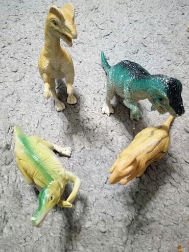 dizalica igracka za decu: Gumeni dinosaurusi dužine 15cm(očuvani)Sva četiri za 500 din