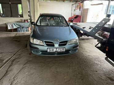 рассрочка авто без первоначального взноса: Автомобиль Nissan Almera синего цвета. Компактный хэтчбек, хорошо