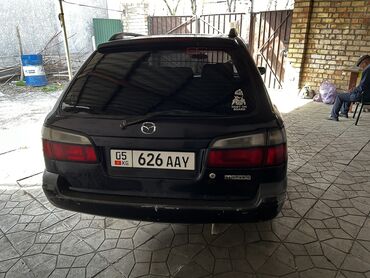 диска титан: Mazda 626: 2000 г., 1.8 л, Механика, Бензин, Универсал