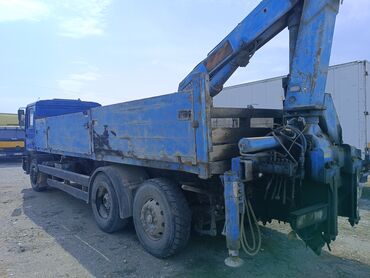 скутора токмок: Манипулятор, MAN