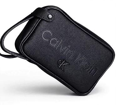 helanke sa slicem: Calvin Klein muška torbica za nošenje preko ruke - Model: kompaktna — 1