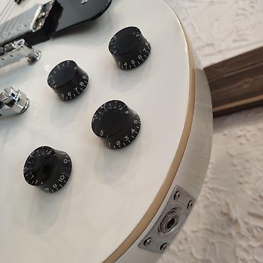 Gitaralar: Elektro-gitara Smiger L-G9 WH Simlərin sayı: 6 Üst: Ağcaqayın Qol: Gül — 3