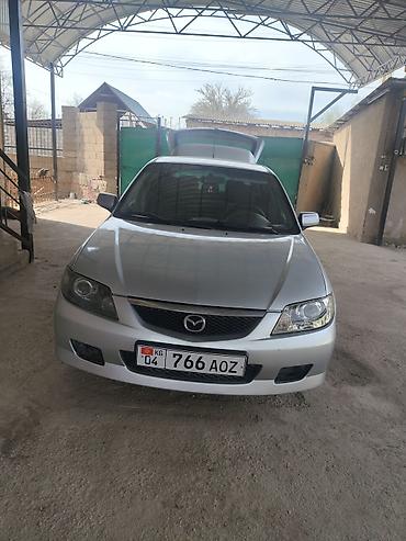 Mazda Familia: 2003 г., 1.6 л, Механика, Бензин, Универсал — 1