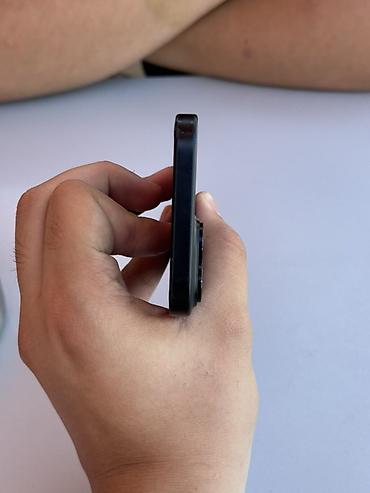 ayfon 16 e: IPhone 15, 128 GB, Qara, Face ID, Simsiz şarj — 6