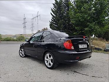 prius 40 kuza: Hyundai Accent: 1.6 l | 2005 il Kupe — 5