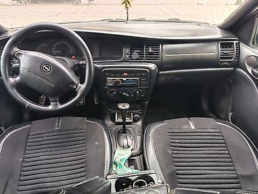 kredit avtomobil: Opel Vectra sedan – tünd yaşıl rəng, 4 qapı, 5 yerlik. Şəhər və tras — 8