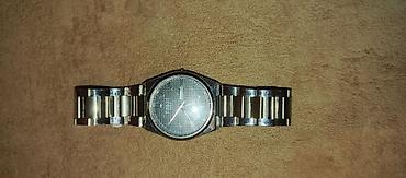 Наручные часы: Tissot kişi qol saatı təcli pul lazım diye ucuz qiymətə qoymuşam yoxsa — 1