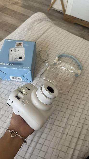 Фото жана видеокамералар: Продаю фотоаппарат Instax Mini 12, в хорошем состоянии. 
торг уместен — 2