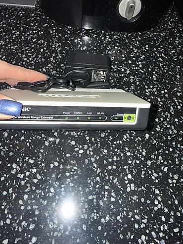 tp link wifi repeater: TP-Link 54Mbps Wireless Range Extender (Wi‑Fi gücləndirici) - Model — 2