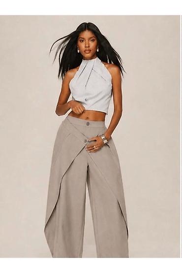 Pantalone: Ženske pantalone širokog kroja sa preklopom – statement model 2400din na lalafo.rs — 16 Pantalone: Ženske pantalone širokog kroja sa preklopom – statement model 2400din — 16