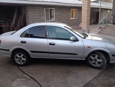 машына приора: Серебристый седан Nissan Almera предлагает практичность и комфорт для