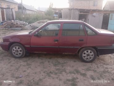 чип для авто: Продается седан Daewoo Nexia темно-красного цвета. Автомобиль оснащен