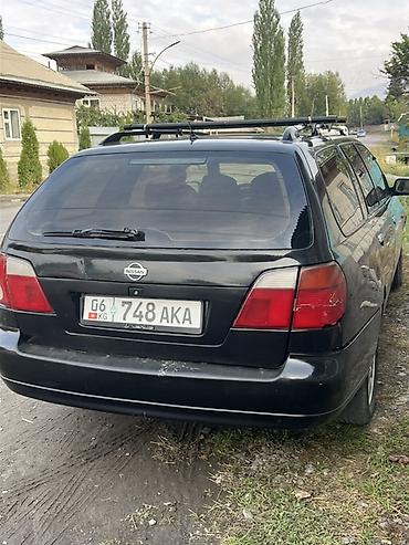 Транспорт: Nissan Primera: 2000 г., 2 л, Механика, Бензин, Универсал — 1