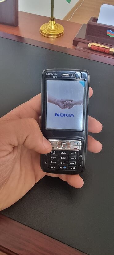 əl telefonu: Nokia N73, rəng - Qara, Düyməli