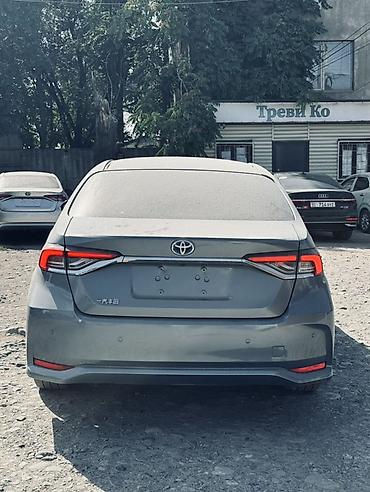 byd e1: Toyota Corolla: 2021 г., 1.8 л, Вариатор, Гибрид, Седан — 3