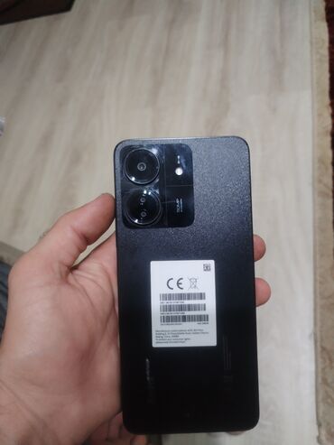 panel radyatör: Redmi 13 8/256 - Arxa blokda iki böyük linzalı kamera modulu və LED