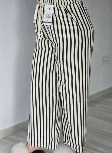Pantalone: 06. Pantalone 
M/L i Xl/2xl — 6