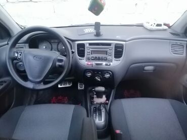 Kia: Kia Pride: 1.5 l | 2006 il Sedan — 4