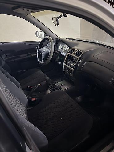 mazda 323 (bh): Mazda 323: 2001 г., 1.6 л, Механика, Бензин, Хэтчбэк — 5