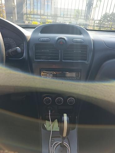 нур мото: Nissan Almera Classic: 2011 г., 1.6 л, Автомат, Бензин, Седан — 8