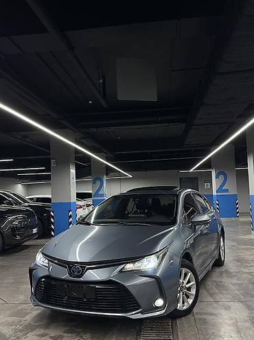 byd e2: Toyota Corolla: 2019 г., 1.8 л, Автомат, Гибрид, Седан — 4