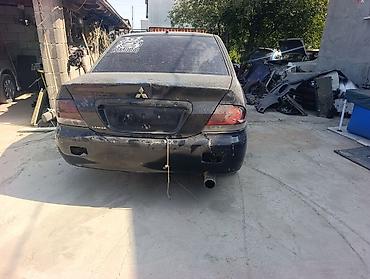 двери виш: Авторазбор Mitsubishi Lancer (седан, поколение 2003–2007). 1.6 бензин — 7