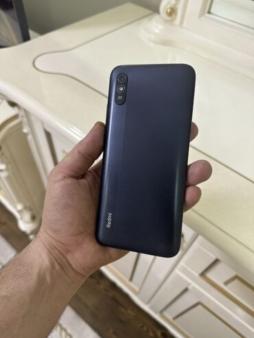 sur mikrafon: Xiaomi Redmi smartfon - Korpus: Mat toxumalı arxa qapaqlı, tünd mavi