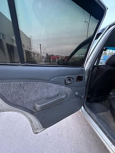 матасыкыл зид: Daewoo Nexia: 2006 г., Кол менен иштөөчү, Бензин, Седан — 5