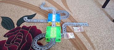 Digər oyuncaqlar: 2 çi şəkildə kiler hot wheels firmasinidir içində yolda var yolun özü — 4