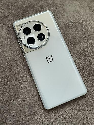 мишь: OnePlus 12, Б/у, 256 ГБ, цвет - Белый, 1 SIM, 2 SIM, eSIM — 6
