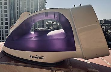 Texnolux buxarlı ütü əla veziyyetde,çox az istifade olunub,heç bir