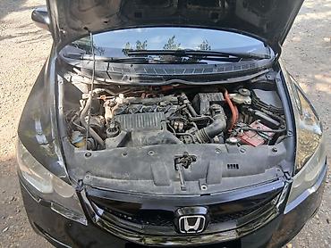 колонку: Honda Civic: 2010 г., 1.3 л, Вариатор, Гибрид, Седан — 6