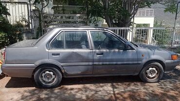 Nissan Sunny: 1.4 l. | 1989 έ. Λιμουζίνα