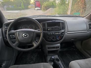 golf iii: Mazda Tribute: 2000 г., 2 л, Механика, Газ, Кроссовер — 8
