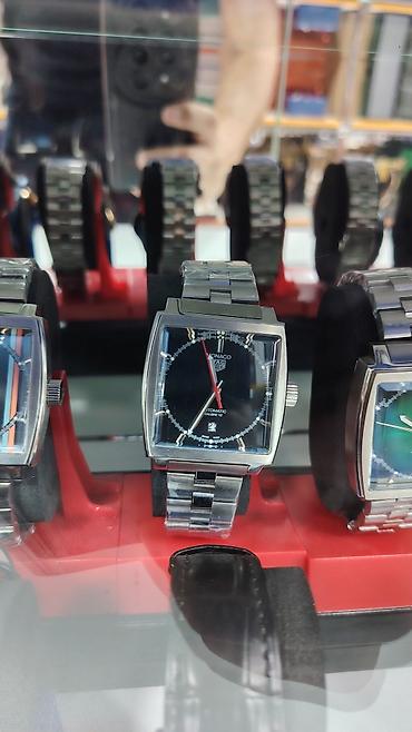 monaco: TAG Heuer Monaco kolleksiyasından kişi qol saatları - Korpus: kvadrat — 9