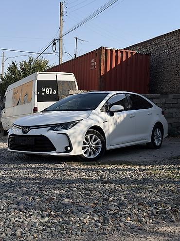 corolla 2006: Toyota Corolla: 2022 г., 1.8 л, Автомат, Гибрид, Седан — 2