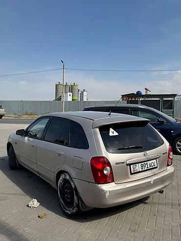 Mazda 323: 2002 г., 1.6 л, Автомат, Бензин, Хэтчбэк