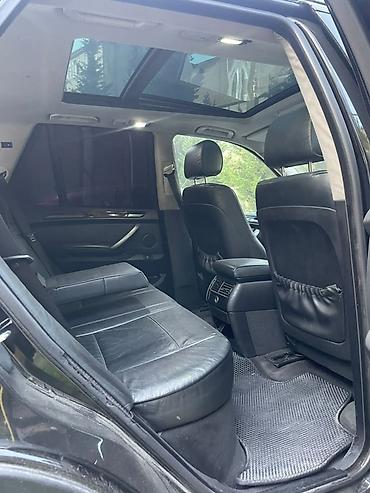 tesla model x: BMW X5 (E53) – qara rəngli, tam ölçülü premium SUV. Texniki və dizayn — 8