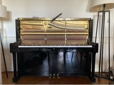 piano ustası: Pianino köklənməsi və təmiri