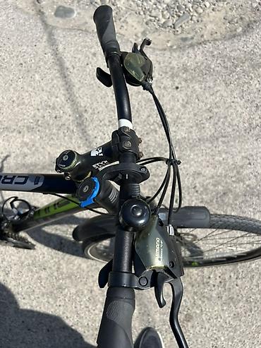 velosiped satislari: Crossbike şəhər/tur tipli velosiped. Qara-yaşıl rəng kombinindədir və — 2